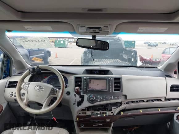 2011 Toyota Sienna XLE AAS with VIN 5TDYK3DC1BS106301, listed as a IAAI auction lot 43423294 with 158,803 mi miles and . Bid and sale history available at DreamBid. Image 5.