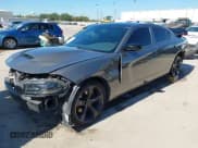 ✅ 2016 Dodge Charger R/T • VIN: 2C3CDXCT0GH237291 • Lot: 43607297. Listed on IAAI with 129,740 mi. Free auction sales archive from the USA and detailed vehicle history report at DreamBid. Image 2.