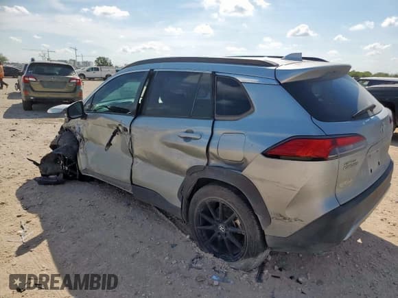 ✅ 2023 Toyota Corolla Cross XLE • VIN: 7MUDAAAG2PV063498 • Лот: 80942835. Опубликован ранее на Copart с пробегом 33 249 миль. Бесплатный доступ к архиву аукционных продаж из США и подробный отчёт об истории автомобиля на DreamBid. Изображение 2.