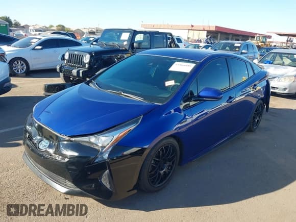 ✅ 2017 Toyota Prius Two • VIN: JTDKBRFU5H3053319 • Lot: 43868989. Listed on IAAI with 111,128 mi. Free auction sales archive from the USA and detailed vehicle history report at DreamBid. Image 2.
