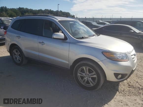 2011 Hyundai Santa Fe SE с VIN 5XYZH4AG3BG018315, выставлен на аукционе Copart как лот 76496954 с пробегом 126 638 миль миль и Списание • Salvage title. История ставок и продаж доступна на DreamBid. Изображение 4.