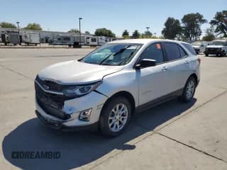 ✅ 2020 Chevrolet Equinox LS • VIN: 2GNAXHEV4L6169489 • Лот: 80621715. Опубликован ранее на Copart с пробегом 87 259 миль. Бесплатный доступ к архиву аукционных продаж из США и подробный отчёт об истории автомобиля на DreamBid. Изображение 1.