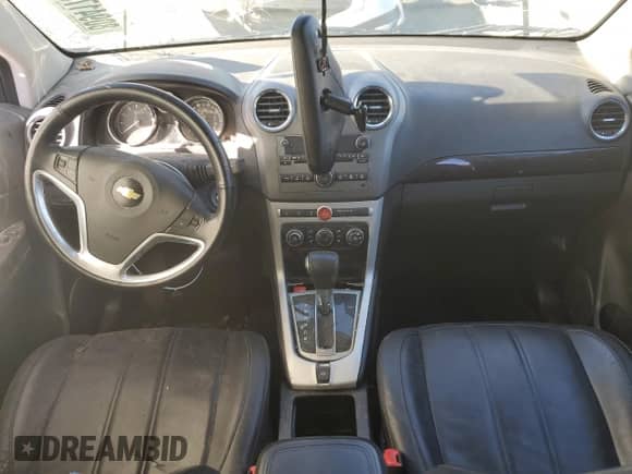 2014 Chevrolet Captiva Sport LTZ с VIN 3GNAL4EK8ES673493, выставлен на аукционе Copart как лот 80941784 с пробегом Не указан миль и Списание • Salvage title. История ставок и продаж доступна на DreamBid. Изображение 8.