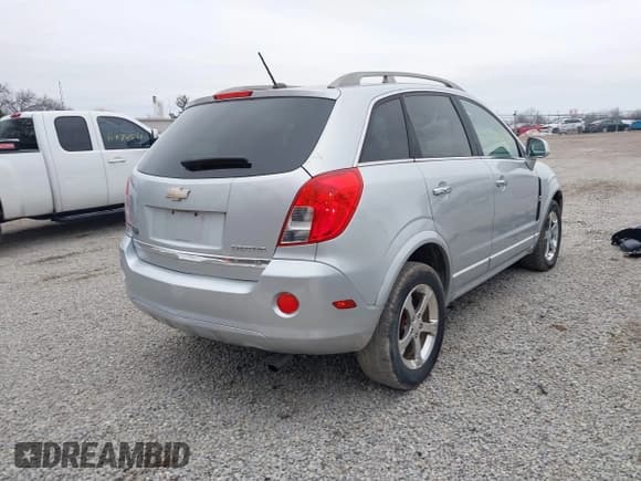 ✅ 2013 Chevrolet Captiva Sport LT • VIN: 3GNFL3EK7DS522580 • Lot: 41502254. Listed on IAAI with 99,476 mi. Free auction sales archive from the USA and detailed vehicle history report at DreamBid. Image 4.
