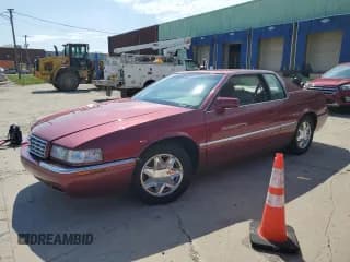 ✅ 1997 Cadillac Eldorado • VIN: 1G6EL12Y5VU614955 • Lot: 56222345. Wystawiony na Copart z przebiegiem 62 030 mil. Bezpłatny archiwum sprzedaży aukcyjnych z USA i szczegółowy raport historii pojazdu na DreamBid. Zdjęcie 1.