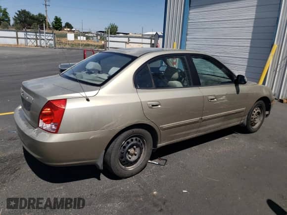 2005 Hyundai Elantra GLS z VIN KMHDN46D35U149616, wystawiony jako Copart lot #81009975 z przebiegiem 233 904 mil mil oraz Szkoda całkowita • Salvage title. Historia ofert i sprzedaży dostępna na DreamBid. Obrazek 3.