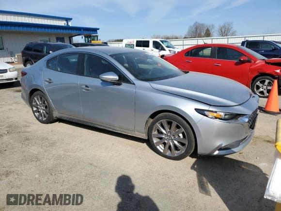 ✅ 2020 Mazda 3 Select • VIN: 3MZBPACL7LM131912 • Lot: 48870835. Listed on Copart with 96,668 mi. Free auction sales archive from the USA and detailed vehicle history report at DreamBid. Image 4.