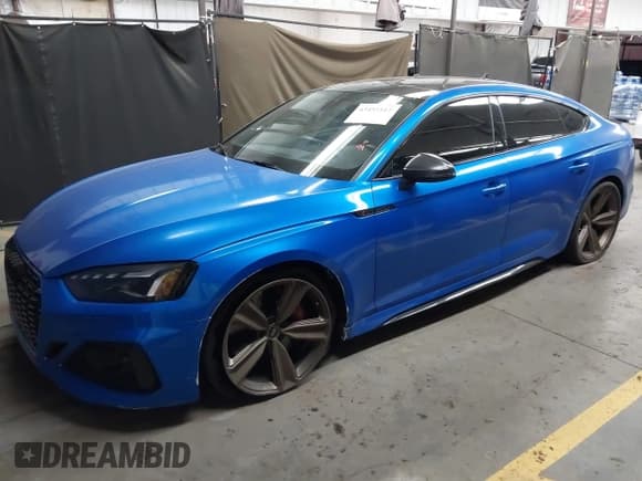 ✅ 2022 Audi RS 5 Sportback • VIN: WUAAWCF51NA902099 • Lot: 43455117. Listed on IAAI with 53,874 mi. Free auction sales archive from the USA and detailed vehicle history report at DreamBid. Image 14.