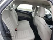 ✅ 2018 Ford Fusion S • VIN: 3FA6P0G76JR165261 • Лот: 90377715. Опубликован ранее на Copart с пробегом 87 901 миль. Бесплатный доступ к архиву аукционных продаж из США и подробный отчёт об истории автомобиля на DreamBid. Изображение 10.