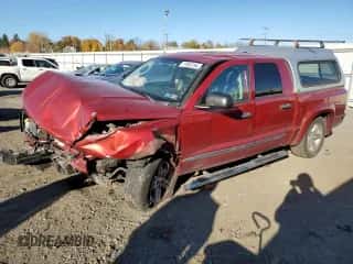 2008 Dodge Dakota Laramie с VIN 1D7HW58N68S602809, выставлен на аукционе Copart как лот 77963754 с пробегом Не указан миль и Списание • Salvage title. История ставок и продаж доступна на DreamBid. Изображение 1.