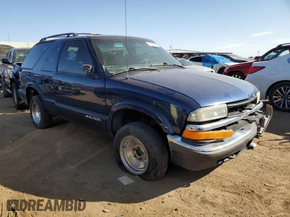 2001 Chevrolet Blazer LS с VIN 1GNCT18W91K189599, выставлен на аукционе Copart как лот 74595674 с пробегом 208 309 миль миль и Списание • Salvage title. История ставок и продаж доступна на DreamBid. Изображение 4.