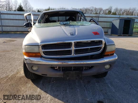 2004 Dodge Dakota SLT z VIN 1D7HG48K94S719243, wystawiony jako Copart lot #52696075 z przebiegiem 172 343 mil mil oraz Nie do naprawy • Non repairable. Historia ofert i sprzedaży dostępna na DreamBid. Obrazek 5.