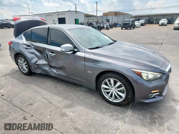 ✅ 2017 Infiniti Q50 2.0t • VIN: JN1CV7AP6HM642443 • Lot: 68663785. Listed on Copart with 98,666 mi. Free auction sales archive from the USA and detailed vehicle history report at DreamBid. Image 4.