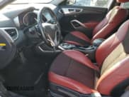 ✅ 2013 Hyundai Veloster w/Gray Int • VIN: KMHTC6AD6DU167644 • Лот: 78494714. Опубликован ранее на Copart с пробегом 103 076 миль. Бесплатный доступ к архиву аукционных продаж из США и подробный отчёт об истории автомобиля на DreamBid. Изображение 7.