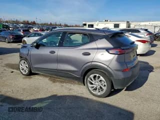 ✅ 2023 Chevrolet Bolt EUV LT • VIN: 1G1FY6S01P4164842 • Лот: 93613665. Опубликован ранее на Copart с пробегом 100 293 миль. Бесплатный доступ к архиву аукционных продаж из США и подробный отчёт об истории автомобиля на DreamBid. Изображение 2.