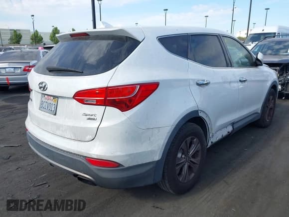 ✅ 2015 Hyundai Santa Fe • VIN: 5XYZTDLB9FG248463 • Лот: 43056598. Опубликован ранее на IAAI с пробегом 128 878 миль. Бесплатный доступ к архиву аукционных продаж из США и подробный отчёт об истории автомобиля на DreamBid. Изображение 4.