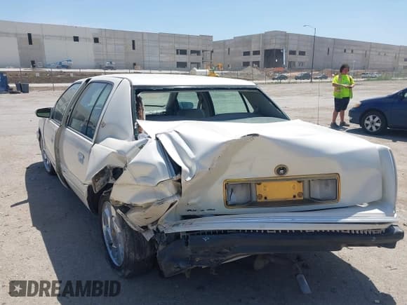 ✅ 1998 Cadillac DeVille • VIN: 1G6KD54Y7WU770095 • Lot: 42768681. Listed on IAAI with Not provided. Free auction sales archive from the USA and detailed vehicle history report at DreamBid. Image 3.