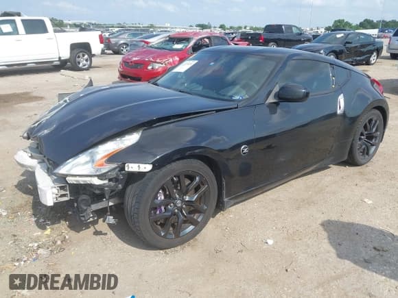 ✅ 2016 Nissan 370Z • VIN: JN1AZ4EH8GM931402 • Lot: 42273424. Wystawiony na IAAI z przebiegiem 105 184 mil. Bezpłatny archiwum sprzedaży aukcyjnych z USA i szczegółowy raport historii pojazdu na DreamBid. Zdjęcie 2.