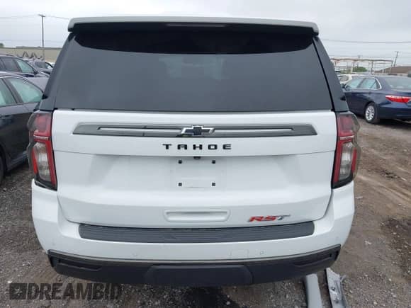 2021 Chevrolet Tahoe RST with VIN 1GNSKRKD6MR481954, listed as a IAAI auction lot 42520451 with 51,819 mi miles and . Bid and sale history available at DreamBid. Image 16.