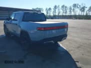 ✅ 2024 Rivian R1T Adventure • VIN: 7FCTGAAA5RN033799 • Лот: 41606562. Опубликован ранее на IAAI с пробегом 9 449 миль. Бесплатный доступ к архиву аукционных продаж из США и подробный отчёт об истории автомобиля на DreamBid. Изображение 3.