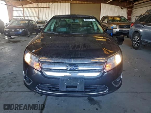 ✅ 2010 Ford Fusion Hybrid • VIN: 3FADP0L30AR133285 • Лот: 94795225. Опубликован ранее на Copart с пробегом 63 801 миль. Бесплатный доступ к архиву аукционных продаж из США и подробный отчёт об истории автомобиля на DreamBid. Изображение 5.