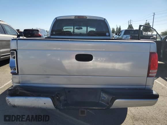 ✅ 2001 Dodge Dakota Sport • VIN: 1B7GL2AN41S137184 • Lot: 82770065. Wystawiony na Copart z przebiegiem 190 696 mil. Bezpłatny archiwum sprzedaży aukcyjnych z USA i szczegółowy raport historii pojazdu na DreamBid. Zdjęcie 6.