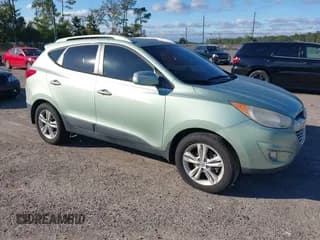 ✅ 2013 Hyundai Tucson Limited • VIN: KM8JU3AC0DU678244 • Lot: 43593885. Listed on IAAI with 142,787 mi. Free auction sales archive from the USA and detailed vehicle history report at DreamBid. Image 1.