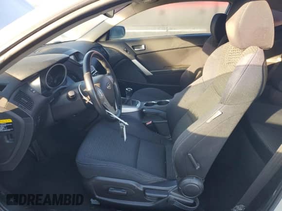 2010 Hyundai Genesis Coupe Premium z VIN KMHHT6KD0AU004424, wystawiony jako Copart lot #89006215 z przebiegiem 128 992 mil mil oraz Szkoda całkowita • Salvage title. Historia ofert i sprzedaży dostępna na DreamBid. Obrazek 7.