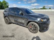 ✅ 2017 Jeep Grand Cherokee • VIN: NCS108376 • Lot: 57158405. Listed on Copart with 101,442 mi. Free auction sales archive from the USA and detailed vehicle history report at DreamBid. Image 4.