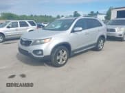 ✅ 2012 Kia Sorento EX • VIN: 5XYKUDA21CG235090 • Lot: 42386362. Listed on IAAI with 163,595 mi. Free auction sales archive from the USA and detailed vehicle history report at DreamBid. Image 2.