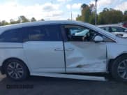 ✅ 2014 Honda Odyssey Touring • VIN: 5FNRL5H93EB043383 • Lot: 43571864. Listed on IAAI with 186,950 mi. Free auction sales archive from the USA and detailed vehicle history report at DreamBid. Image 14.