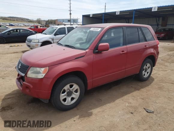 ✅ 2012 Suzuki Grand Vitara Premium • VIN: JS3TD0D20C4101342 • Lot: 51956595. Listed on Copart with 166,710 mi. Free auction sales archive from the USA and detailed vehicle history report at DreamBid. Image 1.