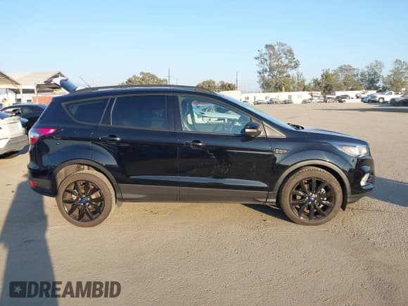 ✅ 2017 Ford Escape Titanium • VIN: 1FMCU0J97HUE96624 • Лот: 43642510. Опубликован ранее на IAAI с пробегом 63 216 миль. Бесплатный доступ к архиву аукционных продаж из США и подробный отчёт об истории автомобиля на DreamBid. Изображение 13.