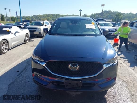 ✅ 2018 Mazda CX-5 Touring • VIN: JM3KFACM5J1473522 • Lot: 43315278. Listed on IAAI with 56,327 mi. Free auction sales archive from the USA and detailed vehicle history report at DreamBid. Image 12.