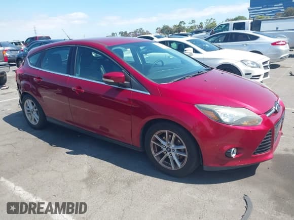 ✅ 2014 Ford Focus Titanium • VIN: 1FADP3N24EL158443 • Lot: 42801477. Listed on IAAI with 116,859 mi. Free auction sales archive from the USA and detailed vehicle history report at DreamBid. Image 1.