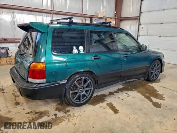 ✅ 1998 Subaru Forester L • VIN: JF1SF6350WG750330 • Lot: 93550415. Listed on Copart with 317,304 mi. Free auction sales archive from the USA and detailed vehicle history report at DreamBid. Image 3.