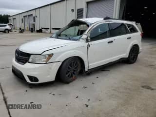 2011 Dodge Journey SXT с VIN 3D4PG5FG1BT566558, выставлен на аукционе Copart как лот 67913875 с пробегом 276 567 миль миль и Списание • Salvage title. История ставок и продаж доступна на DreamBid. Изображение 1.