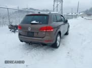 ✅ 2011 Volkswagen Touareg Sport • VIN: WVGFF9BP4BD000338 • Lot: 43792411. Listed on IAAI with 20,972 mi. Free auction sales archive from the USA and detailed vehicle history report at DreamBid. Image 4.