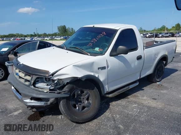 ✅ 1997 Ford F-150 • VIN: 1FTDF18W5VKD72475 • Лот: 42382038. Опубликован ранее на IAAI с пробегом 101 891 миль. Бесплатный доступ к архиву аукционных продаж из США и подробный отчёт об истории автомобиля на DreamBid. Изображение 2.