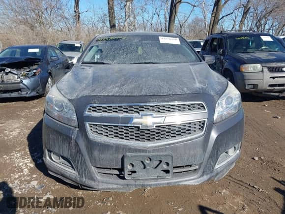 2013 Chevrolet Malibu LT z VIN 1G11E5SA4DF255089, wystawiony jako IAAI lot #41376450 z przebiegiem 159 824 mil mil oraz . Historia ofert i sprzedaży dostępna na DreamBid. Obrazek 12.