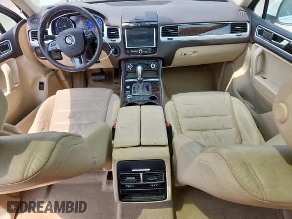 ✅ 2013 Volkswagen Touareg Exec • VIN: WVGEF9BP3DD012463 • Lot: 57499915. Listed on Copart with 104,981 mi. Free auction sales archive from the USA and detailed vehicle history report at DreamBid. Image 8.