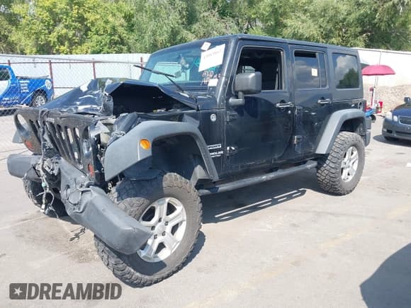 ✅ 2012 Jeep Wrangler Unlimited Sport • VIN: 1C4BJWDG2CL201563 • Lot: 43083863. Listed on IAAI with Not provided. Free auction sales archive from the USA and detailed vehicle history report at DreamBid. Image 17.