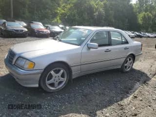 ✅ 1998 Mercedes-Benz C 230/260/280/320 • VIN: WDBHA23G6WA554827 • Лот: 64129885. Опубликован ранее на Copart с пробегом 135 990 миль. Бесплатный доступ к архиву аукционных продаж из США и подробный отчёт об истории автомобиля на DreamBid. Изображение 1.