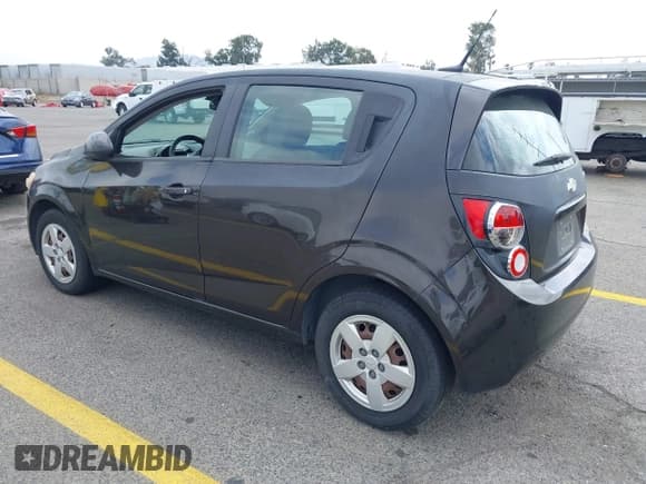 ✅ 2013 Chevrolet Sonic LS • VIN: 1G1JA6SG3D4239239 • Lot: 43304489. Listed on IAAI with 100,388 mi. Free auction sales archive from the USA and detailed vehicle history report at DreamBid. Image 3.