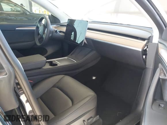 ✅ 2023 Tesla Model Y Long Range • VIN: 7SAYGDEE4PF694216 • Lot: 42180693. Listed on IAAI with 29,303 mi. Free auction sales archive from the USA and detailed vehicle history report at DreamBid. Image 5.