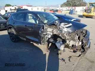 ✅ 2022 Mazda CX-5 S Premium Plus • VIN: JM3KFBEM2N1522314 • Lot: 43529352. Wystawiony na IAAI z przebiegiem 38 183 mil. Bezpłatny archiwum sprzedaży aukcyjnych z USA i szczegółowy raport historii pojazdu na DreamBid. Zdjęcie 1.