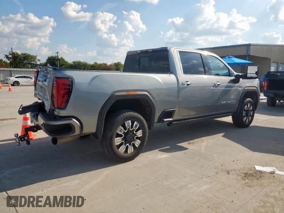 ✅ 2024 GMC Sierra 2500HD Denali • VIN: 1GT49REY2RF275888 • Лот: 80721695. Опубликован ранее на Copart с пробегом 39 669 миль. Бесплатный доступ к архиву аукционных продаж из США и подробный отчёт об истории автомобиля на DreamBid. Изображение 3.