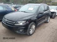 ✅ 2014 Volkswagen Tiguan S • VIN: WVGBV3AX5EW512425 • Lot: 43754178. Listed on IAAI with 157,539 mi. Free auction sales archive from the USA and detailed vehicle history report at DreamBid. Image 2.