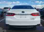 2021 Toyota Camry Hybrid LE with VIN 4T1C31AK8MU030335, listed as a IAAI auction lot 43438433 with 79,774 mi miles and . Bid and sale history available at DreamBid. Image 16.