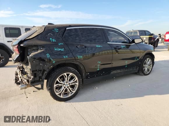 ✅ 2022 BMW X2 xDrive28i • VIN: WBXYJ1C02N5U19529 • Lot: 82496685. Listed on Copart with 86,230 mi. Free auction sales archive from the USA and detailed vehicle history report at DreamBid. Image 3.